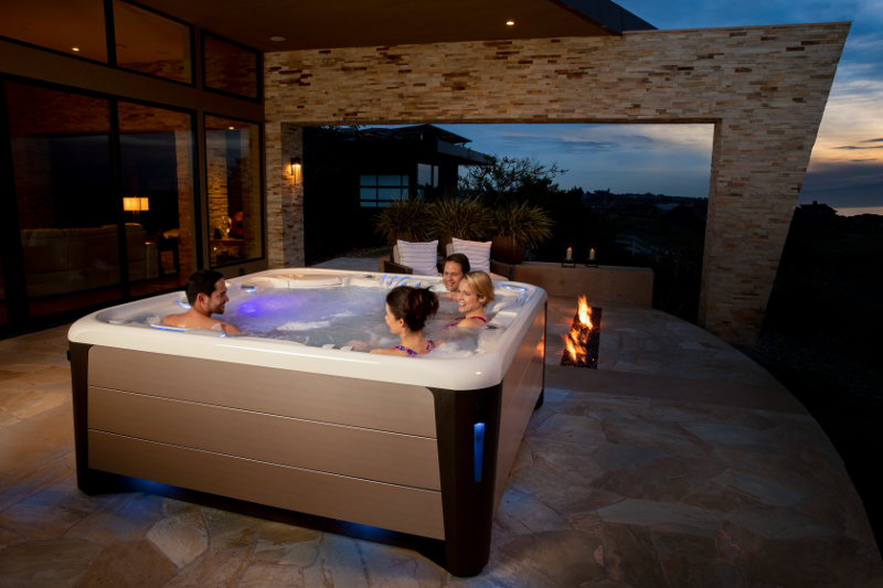 The Highlife® Envoy™ - luxurious relaxation for all (seen in Alpine White shell and Bronze cabinet) | HotSpring Spas